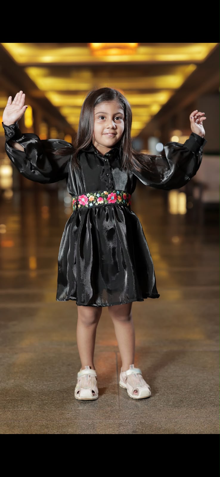 Black shimmer dress with floral embroidered belt