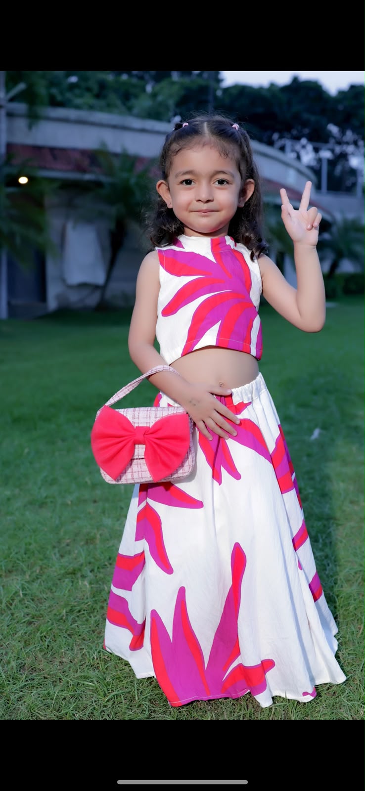 White crop top and skirt set with pink leaf print